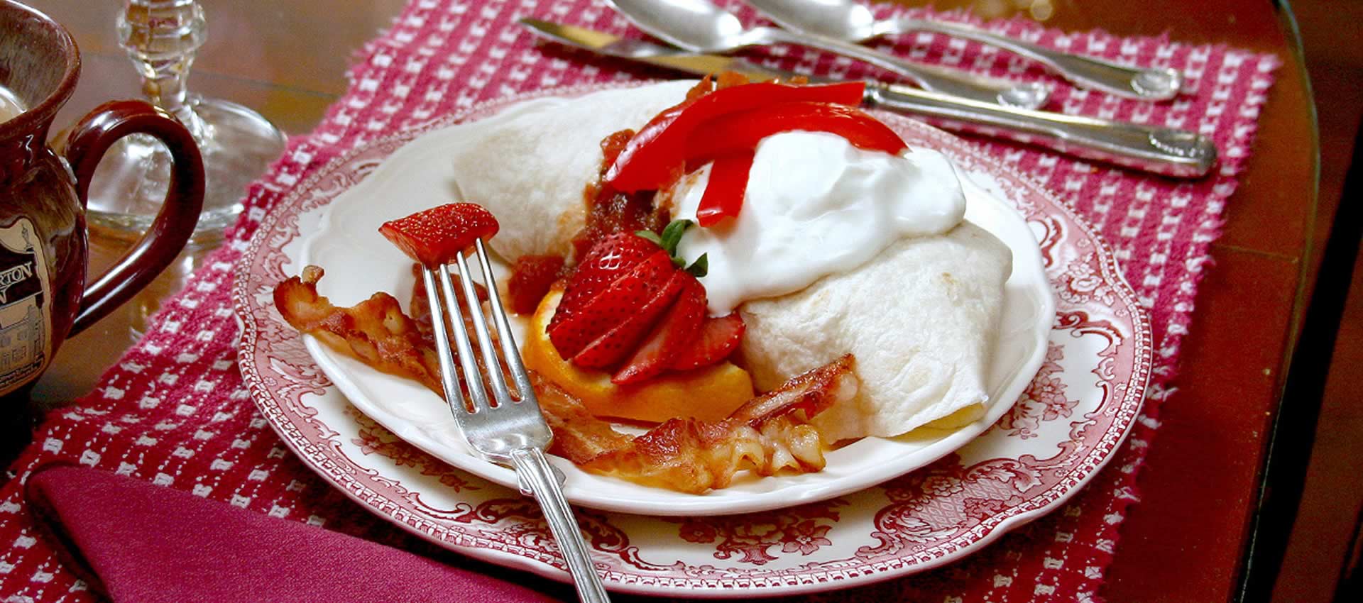 breakfast burrito with bacon and strawberrys