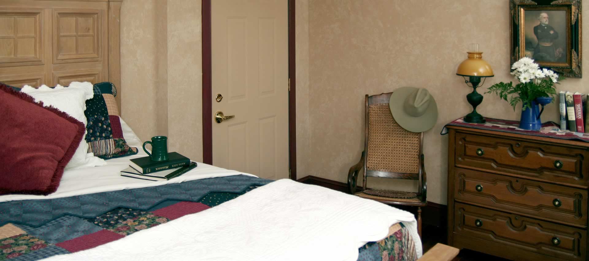 Officer’s Quarterss bed and dresser, chair and hat