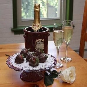 Romance Package is a bottle of white wine and 6 delicious chocolates