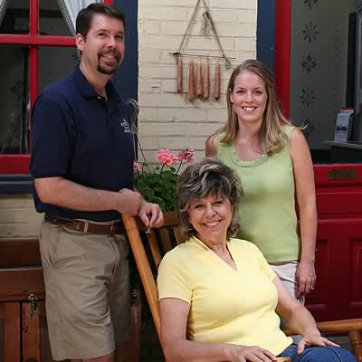 Your innkeepers on the patio of the inn, Joan, Brian and AmyBeth Hodges